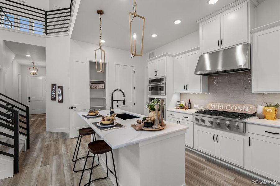 Furnished interior view inside a new home in Revel Crossing at Wolf Ranch - The Panorama Collection, Colorado Springs (Image 17).