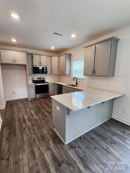 Furnished interior view inside a new home in , Charlotte (Image 9).