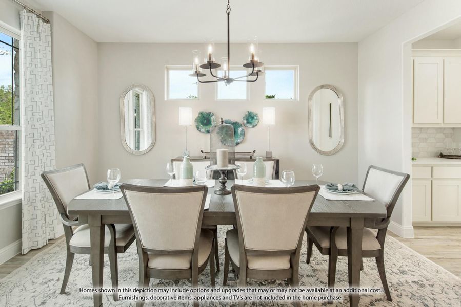 Formal dining room with six-seat gray wood table, chandelier, and large windows on hardwood floors Formal dining room with six-seat gray wood table, chandelier, and large windows on hardwood floors