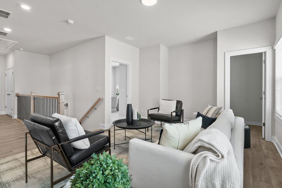 Representative furnished interior of a home built from the The Bullard by The Providence Group in Promenade at Sawnee Village, Cumming (Image 36).