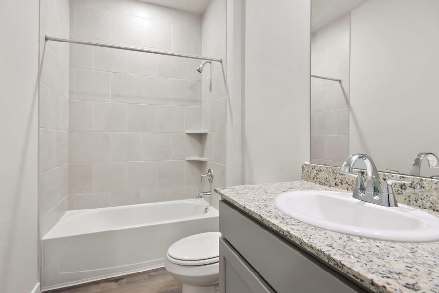 Furnished interior view inside a new home in Lakes at Crockett Martin, Conroe (Image 10).