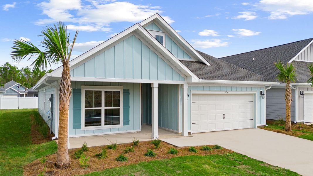 Front exterior of a new home in Breakfast Point East Phase II, Panama City Beach, FL, highlighting curb appeal (Image 2).
