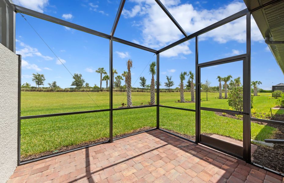Exterior details and patio area of a home in Del Webb Naples, Ave Maria (Image 3).
