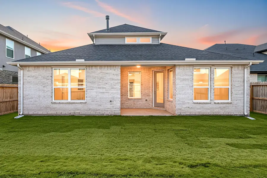 Exterior details and patio area of a home in Harvest Green, Richmond (Image 3). Exterior details and patio area of a home in Harvest Green, Richmond (Image 3).