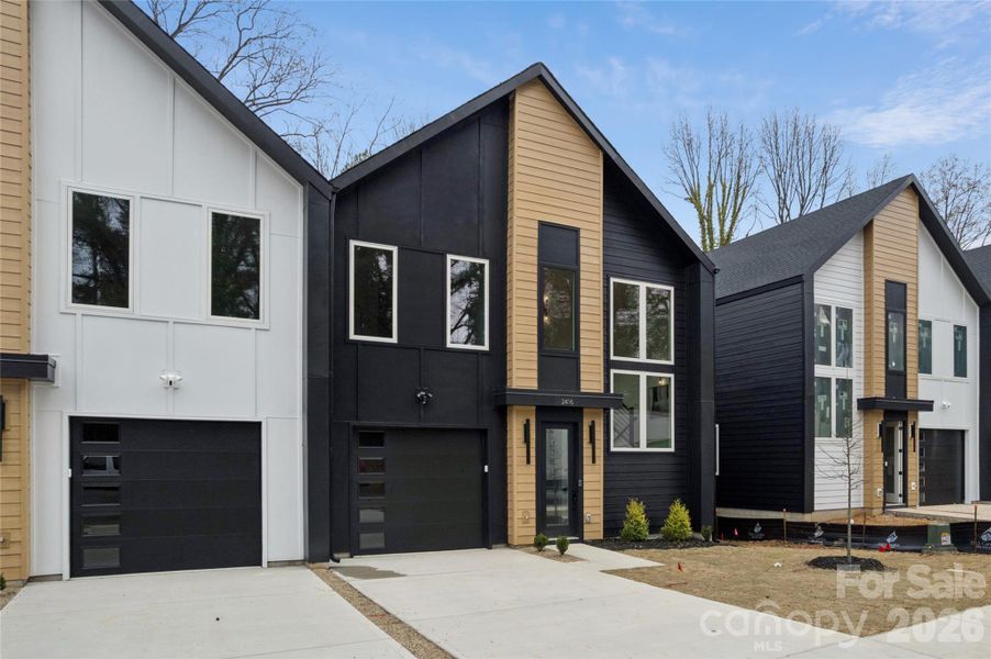 Front exterior of a new home in , Charlotte, NC, highlighting curb appeal (Image 2). Front exterior of a new home in , Charlotte, NC, highlighting curb appeal (Image 2).