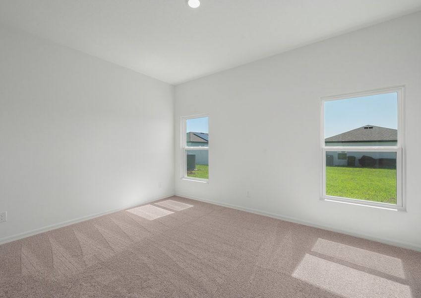 Two large windows in the master bedroom face the back yard Two large windows in the master bedroom face the back yard