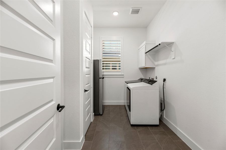 Furnished interior view inside a new home in Bridgeland, Cypress (Image 41).