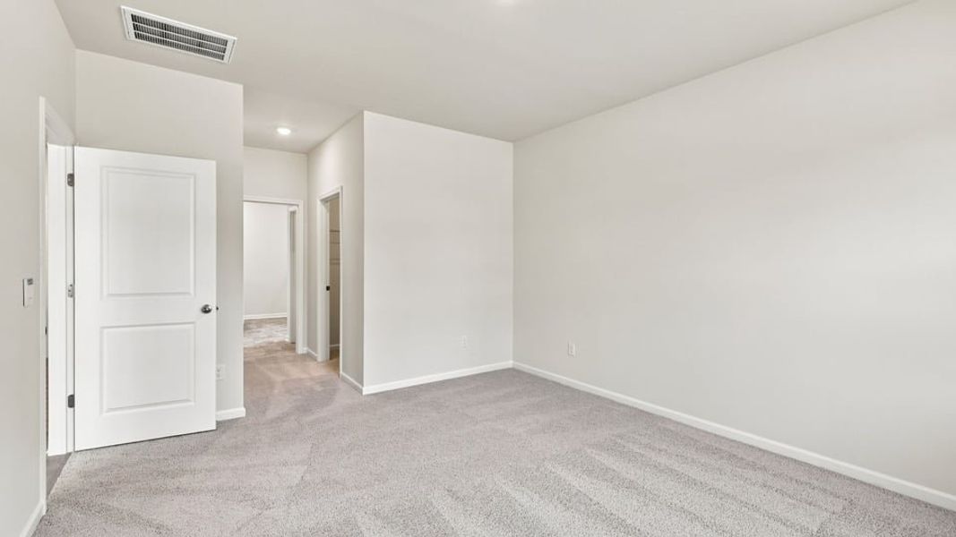 Spacious, unfurnished interior of a new home in Durbin Meadows Traditions, Fountain Inn (Image 26).