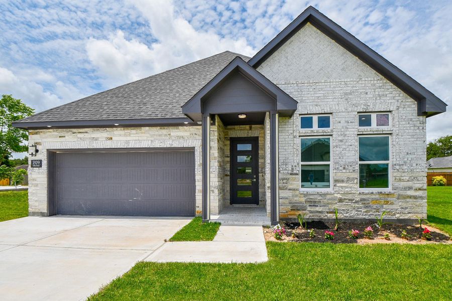 Front exterior of a new home in , Sweeny, TX, highlighting curb appeal (Image 2).