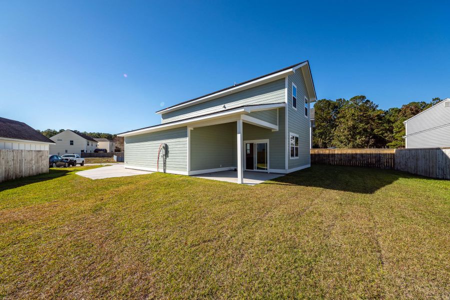 Exterior details and patio area of a home in , Huger (Image 2).