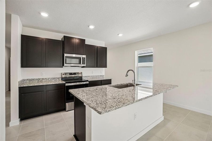Furnished interior view inside a new home in Willowbrook North, Winter Haven (Image 8). Furnished interior view inside a new home in Willowbrook North, Winter Haven (Image 8).