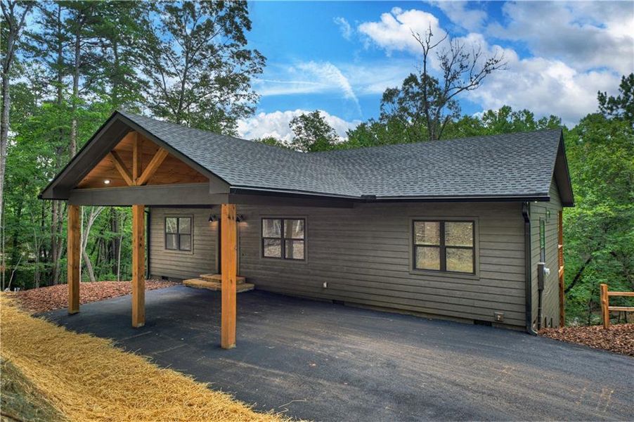 Exterior details and patio area of a home in , Ellijay (Image 27).