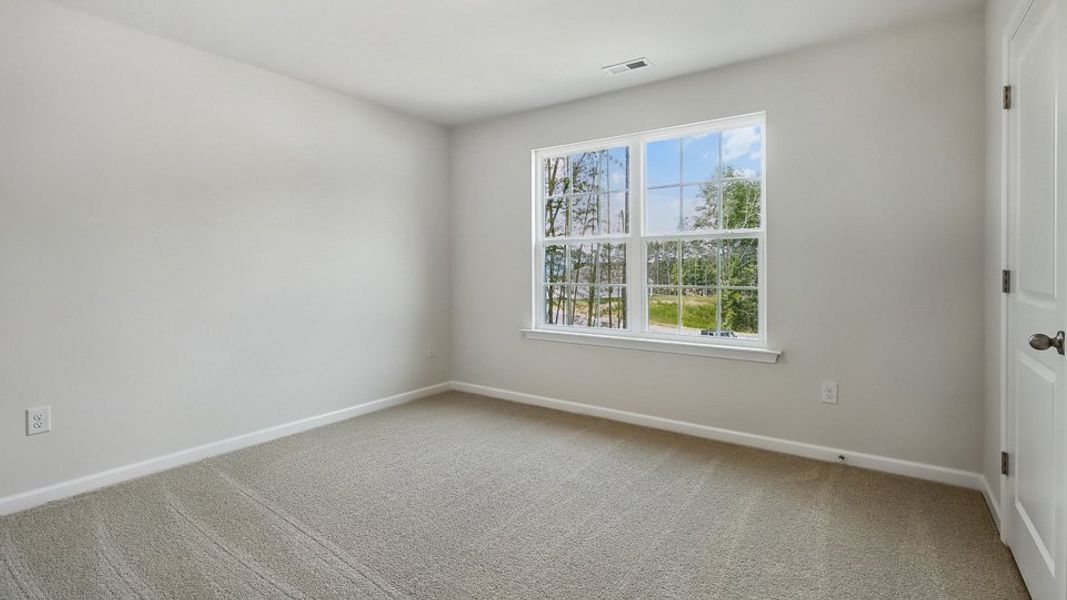 Spacious, unfurnished interior of a new home in The Landing at Summerhaven, Mebane (Image 29).
