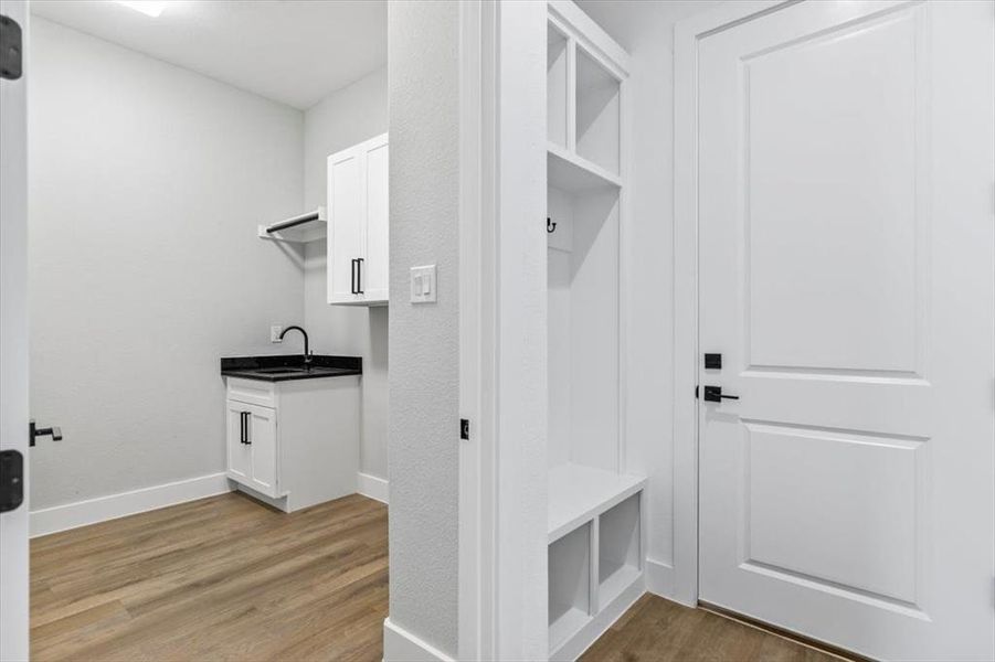 Mudroom and Utility room with utility sink