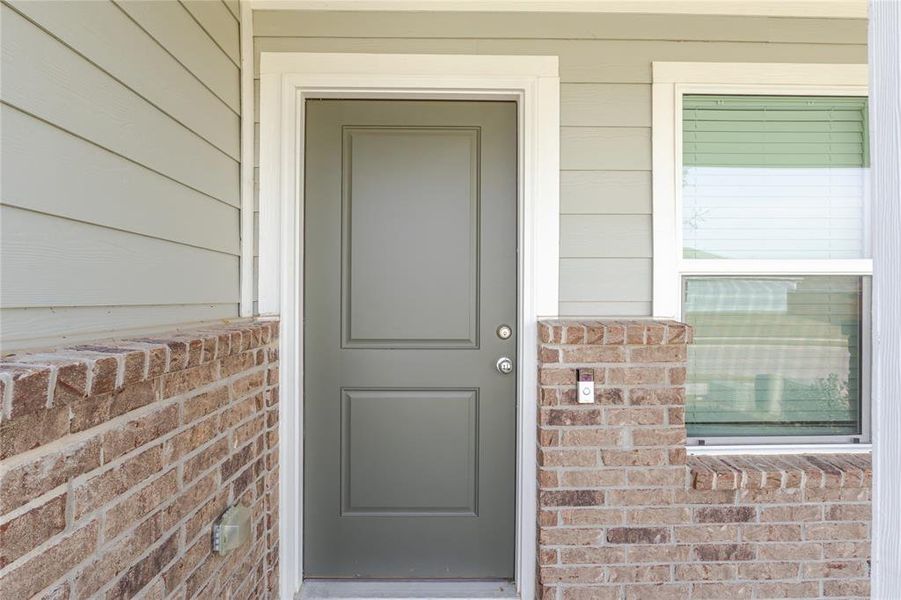 Exterior details and patio area of a home in Preserve at Honey Creek: Watermill Collection, McKinney (Image 2).