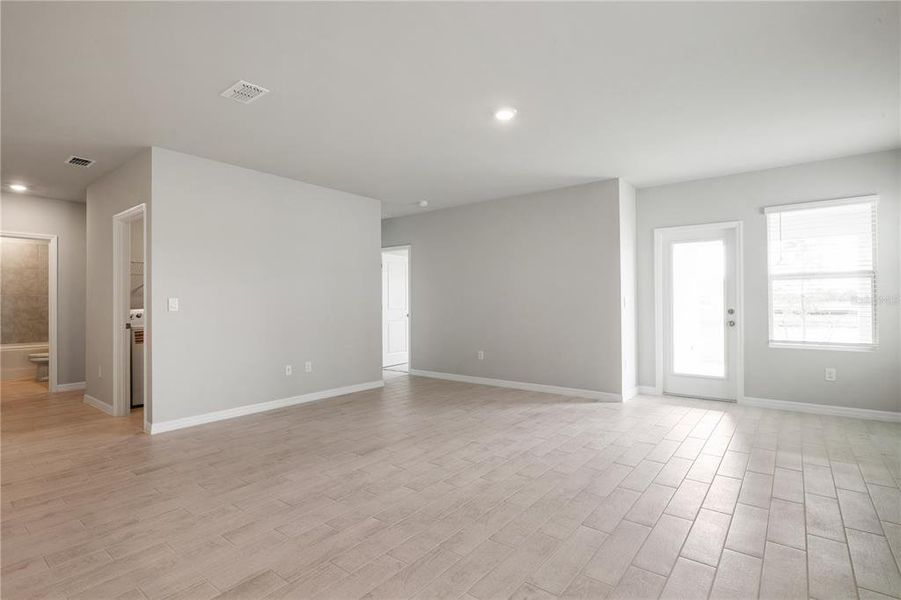 Spacious, unfurnished interior of a new home in Coral Lakes - Tradition & Express, Punta Gorda (Image 12). Spacious, unfurnished interior of a new home in Coral Lakes - Tradition & Express, Punta Gorda (Image 12).