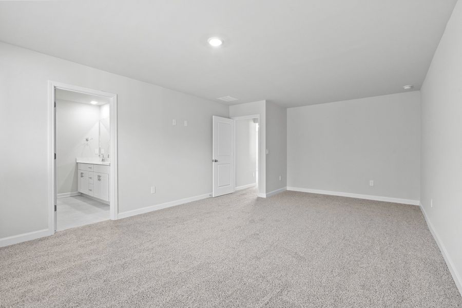 Spacious, unfurnished interior of a new home in Waterside - Coastline Series, Longs (Image 24).