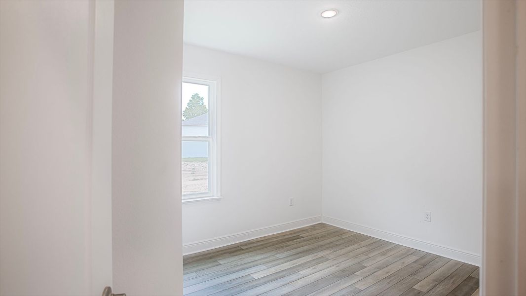 Spacious, unfurnished interior of a new home in Heritage Station, Punta Gorda (Image 13).