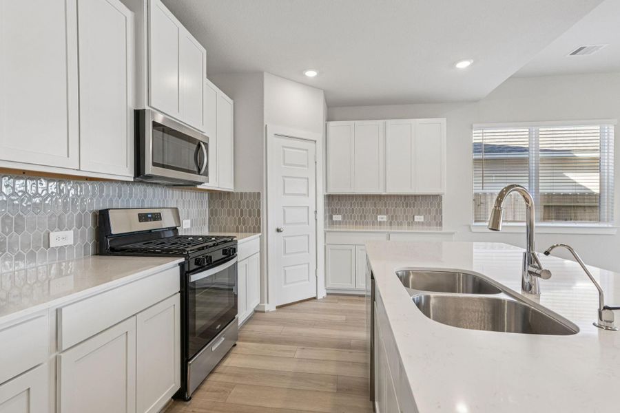 Photo is not of the actual home, but is an inspirational photo of builder’s model home and may depict options, furnishings, and/or decorator features that are not included