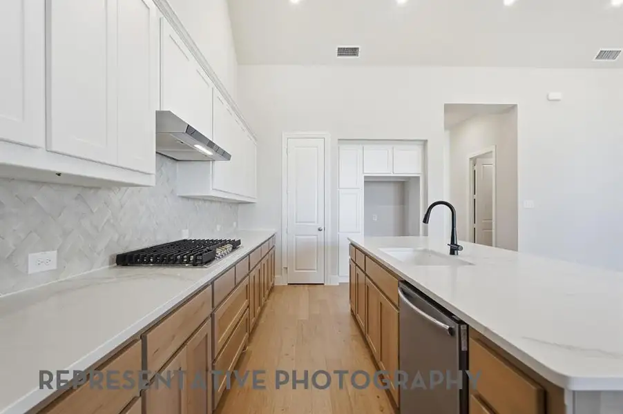 Furnished interior view inside a new home in Pecan Square, Northlake (Image 3). Furnished interior view inside a new home in Pecan Square, Northlake (Image 3).