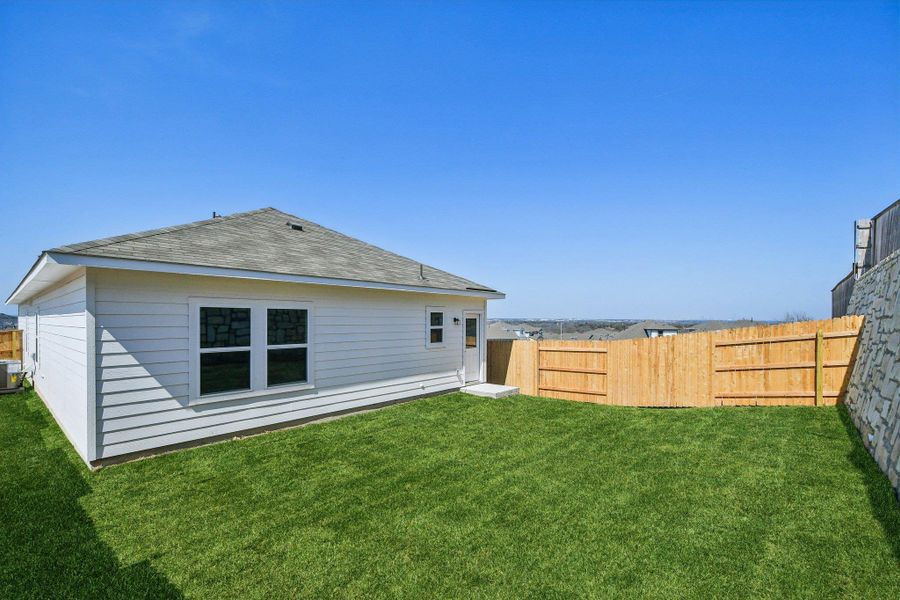 Rear of Home & Private Backyard of Home