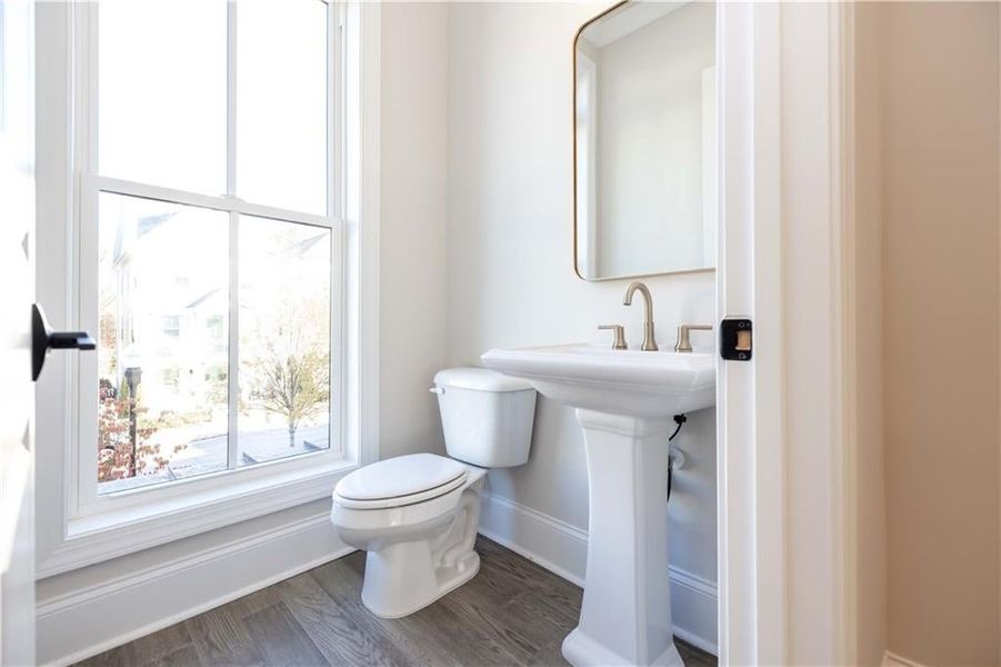 Powder is spacious and bright with large window - just need to add your own style of curtain or blinds*Image is of previously built home* Powder is spacious and bright with large window - just need to add your own style of curtain or blinds*Image is of previously built home*