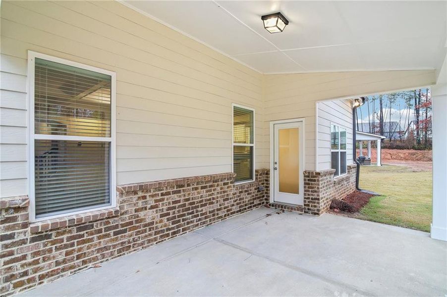Exterior details and patio area of a home in Pinecrest Ridge, Dacula (Image 25). Exterior details and patio area of a home in Pinecrest Ridge, Dacula (Image 25).