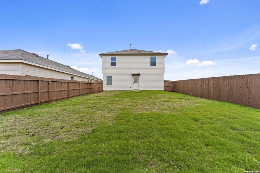 Exterior details and patio area of a home in Avenida, Converse (Image 2).