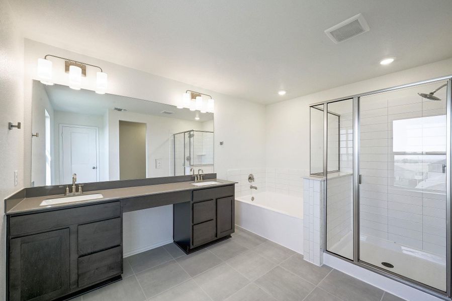 Furnished interior view inside a new home in Salerno - Classic Collection, Round Rock (Image 9). Furnished interior view inside a new home in Salerno - Classic Collection, Round Rock (Image 9).