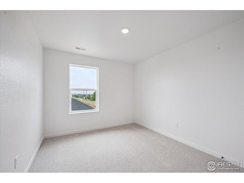 Spacious, unfurnished interior of a new home in Hansen Farm, Fort Collins (Image 21).