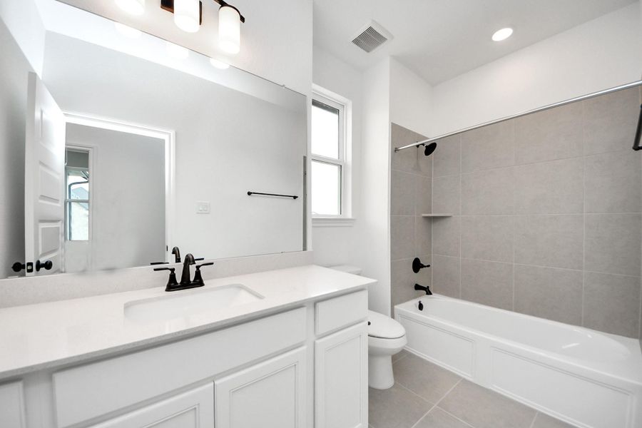 Furnished interior view inside a new home in Elyson, Katy (Image 8).