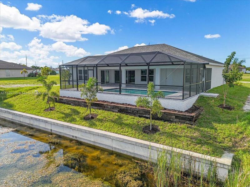 Front exterior of a new home in Cape Coral, Cape Coral, FL, highlighting curb appeal (Image 16).