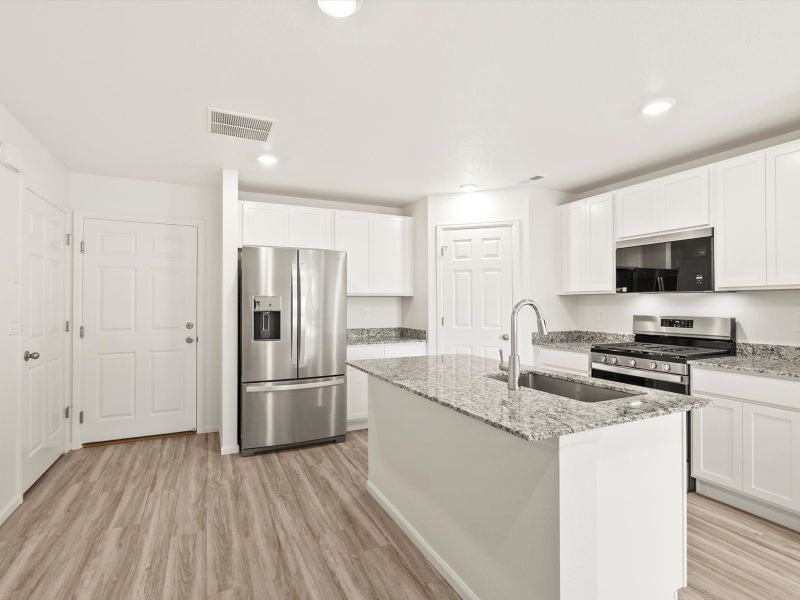 Furnished interior view inside a new home in Skyview at High Point, Aurora (Image 3).