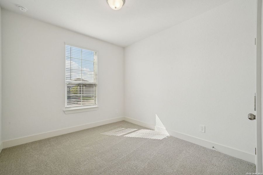 Spacious, unfurnished interior of a new home in Estancia Ranch - Premier Series, San Antonio (Image 17).