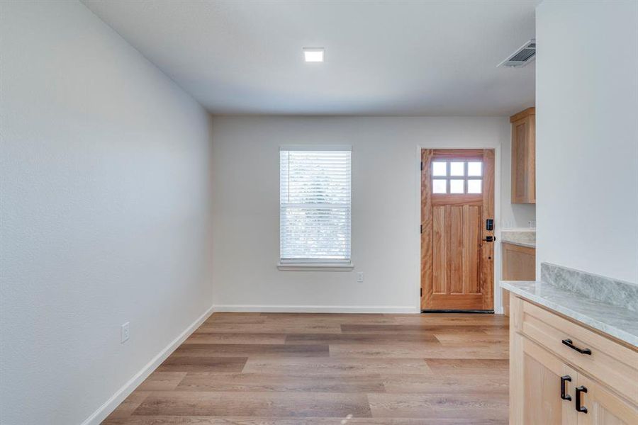 Foyer featuring light hardwood / wood-style floors