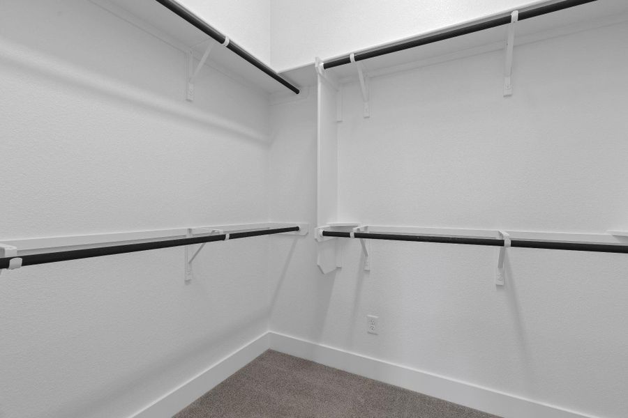 Walk-in closet in Primary Bedroom