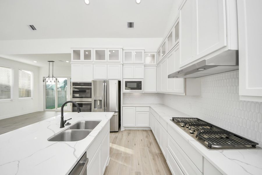 Furnished interior view inside a new home in Meridiana, Manvel (Image 10).