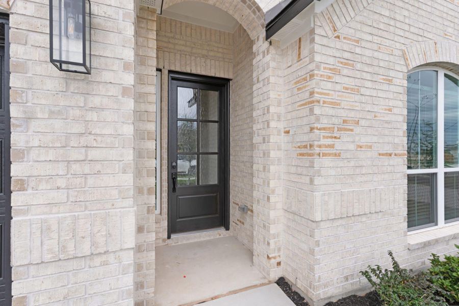 Exterior details and patio area of a home in The Grove at Blackhawk, Pflugerville (Image 24).