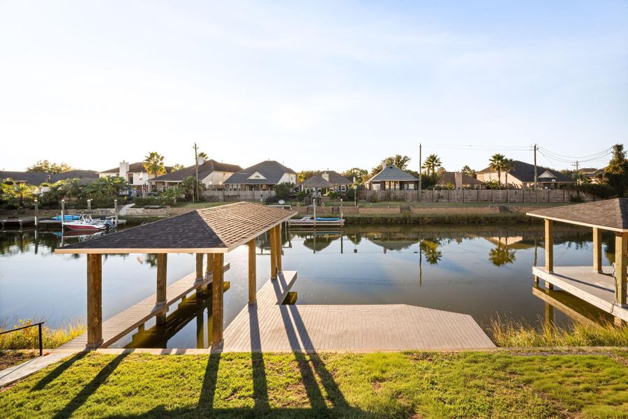 Covered boat slip and dock ideal for fishing and relaxing.