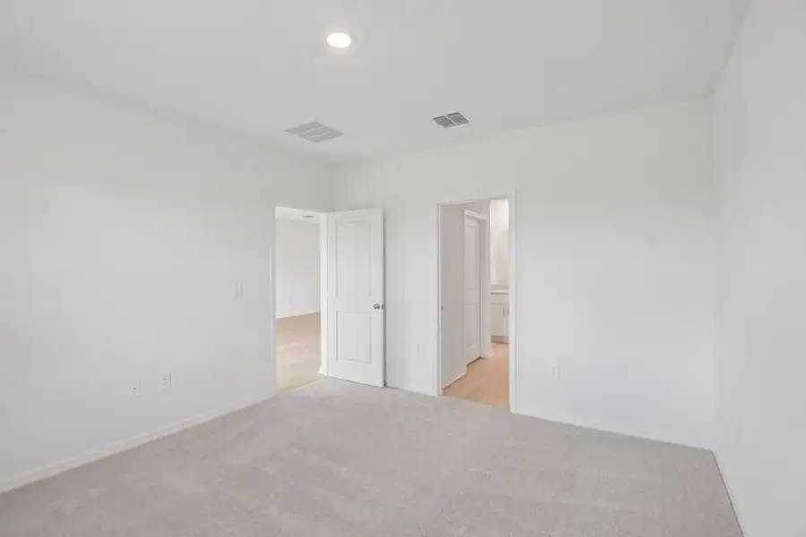 Representative unfurnished interior of a home built from the Blackbird by Taylor Morrison in Azure at Solaeris, Port St. Lucie (Image 8).