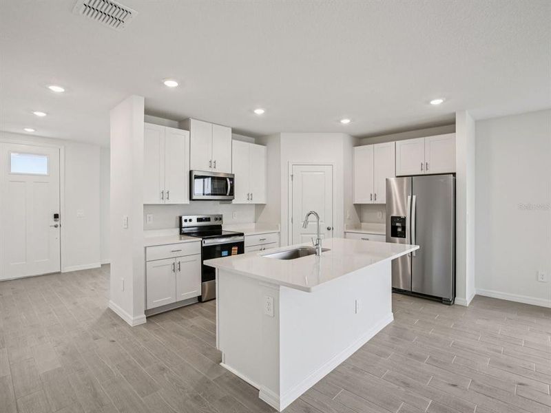 Furnished interior view inside a new home in Magnolia Bay - Classic Series, Nokomis (Image 3).