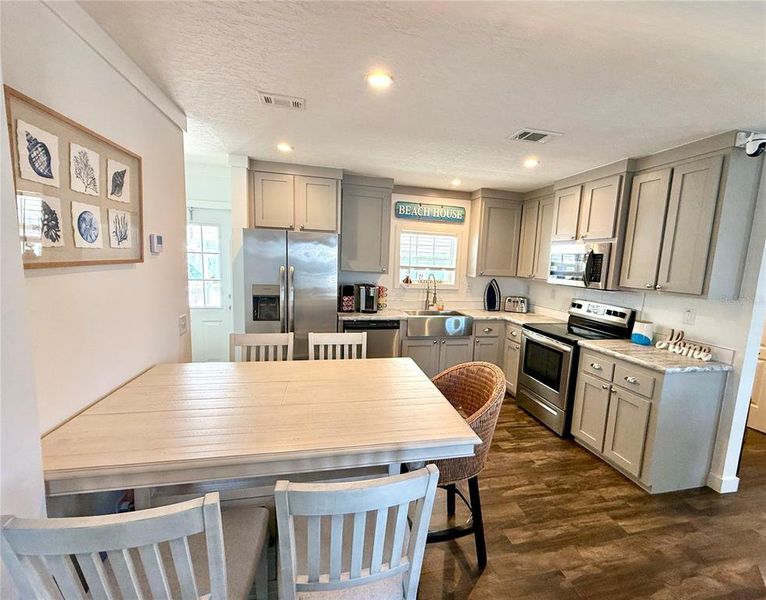 Furnished interior view inside a new home in , Sarasota (Image 32).