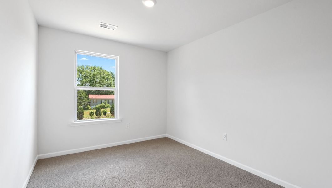 Spacious, unfurnished interior of a new home in Chestnut Ridge Townhomes, Greenville (Image 19).