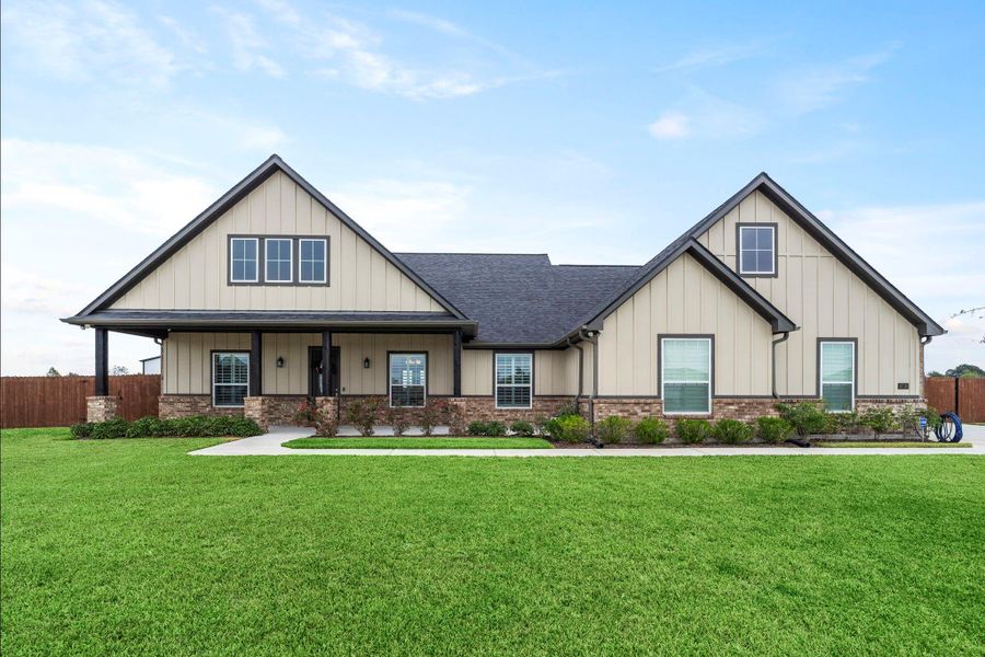 Front exterior of a new home in , Needville, TX, highlighting curb appeal (Image 25). Front exterior of a new home in , Needville, TX, highlighting curb appeal (Image 25).