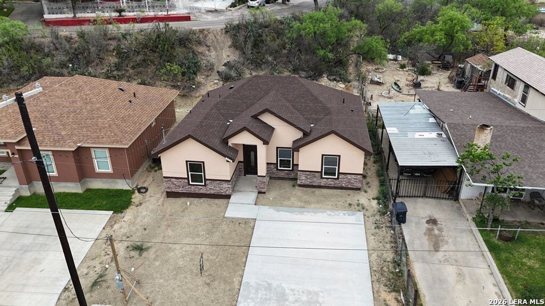 Front exterior of a new home in , Eagle Pass, TX, highlighting curb appeal (Image 17). Front exterior of a new home in , Eagle Pass, TX, highlighting curb appeal (Image 17).