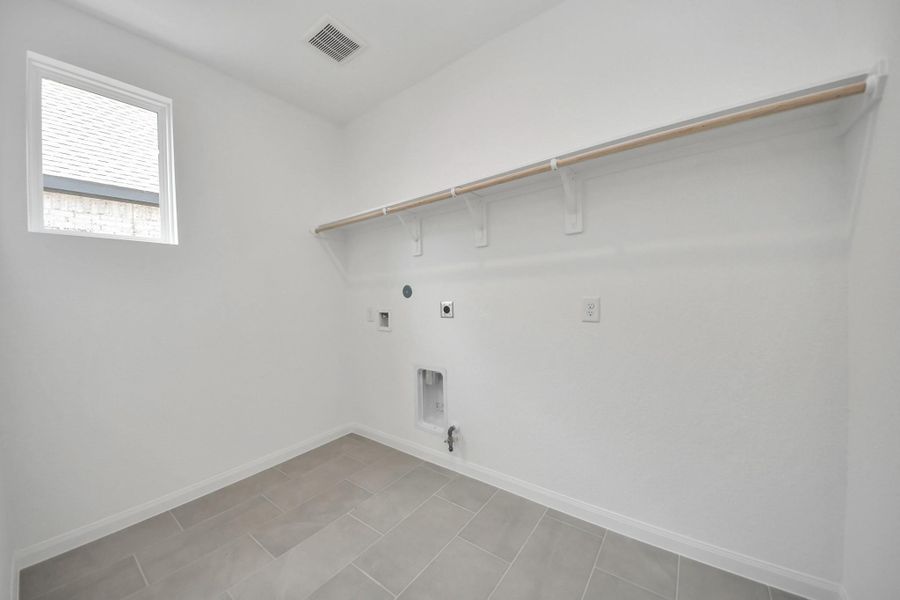 Spacious, unfurnished interior of a new home in 50' Traditional Homes at Elyson, Katy (Image 19).