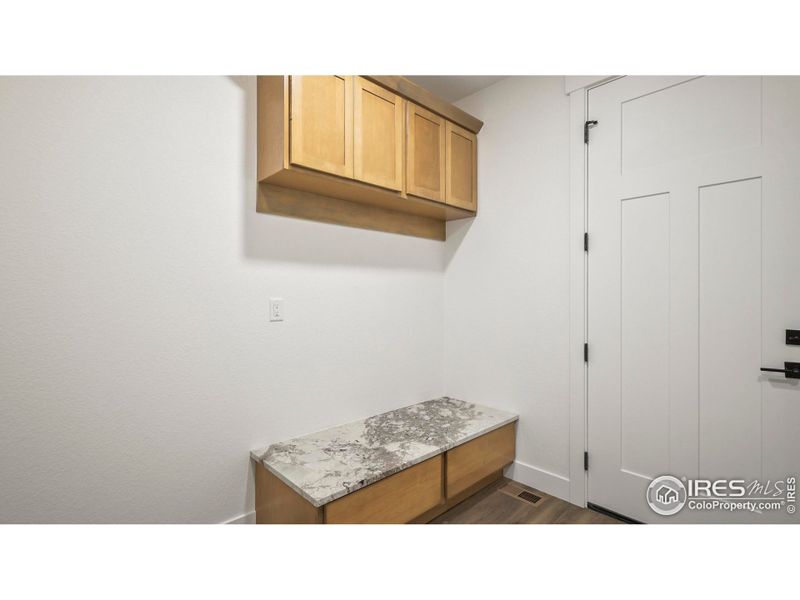 Bench & cabinets in mud room off of garage Bench & cabinets in mud room off of garage