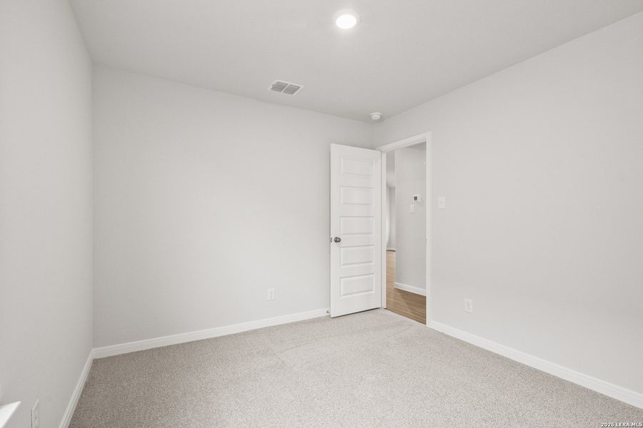 Spacious, unfurnished interior of a new home in Abbott Place, St. Hedwig (Image 11).