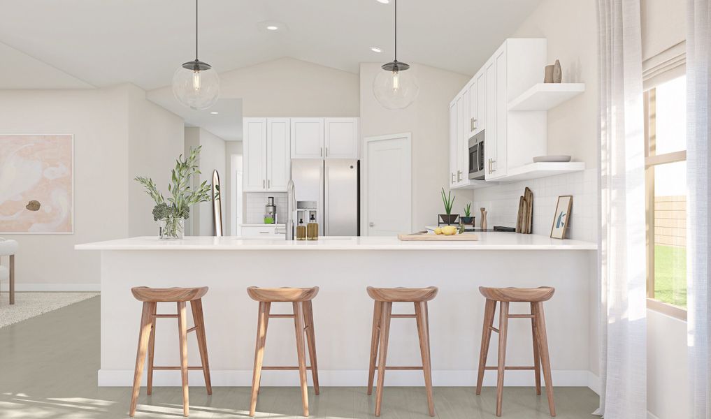 Kitchen with pendant lighting and chrome hardware