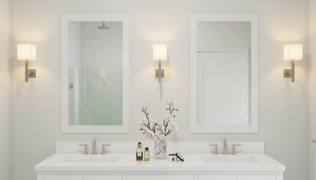 Primary bath with white-framed mirrors Primary bath with white-framed mirrors